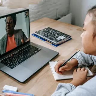 Student learning with a GCSE tutor online